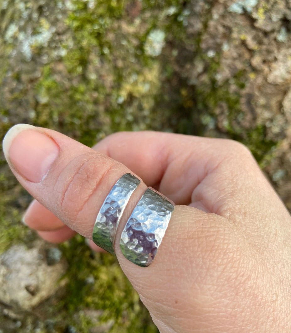 Wrapped round finger hammered silver ring course