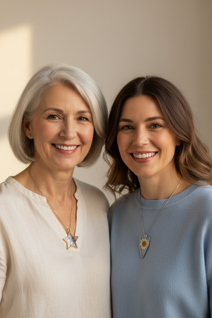 Mum aged 60 and daughter aged 40 wearing resin pendant necklaces